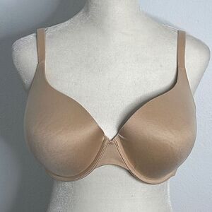 Mae size 38D beige underwire bra.  Seamless edges.